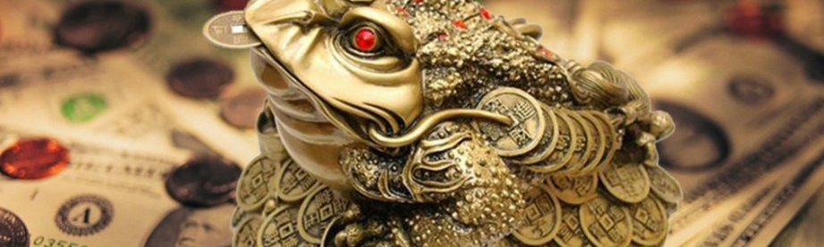 Un broasca cu o monedă în gură - un talisman pentru a atrage bani